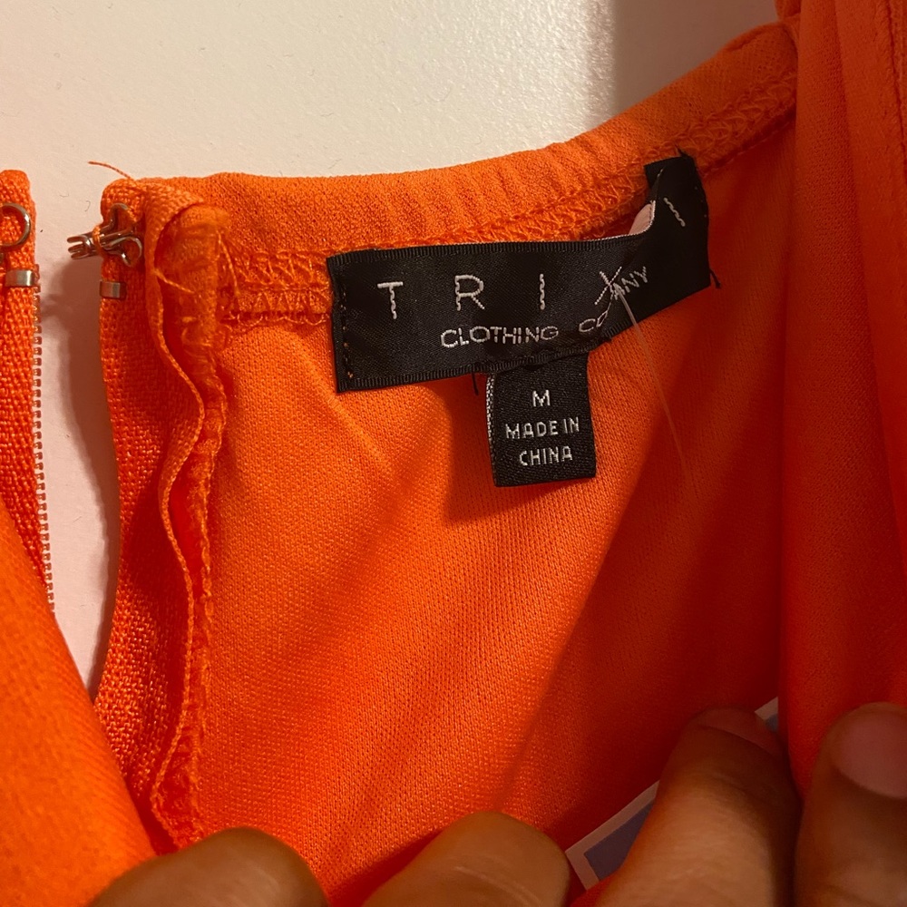 Orange one piece, brand new never worn.